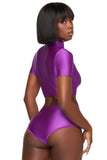 Top corto morado de manga corta con cremallera