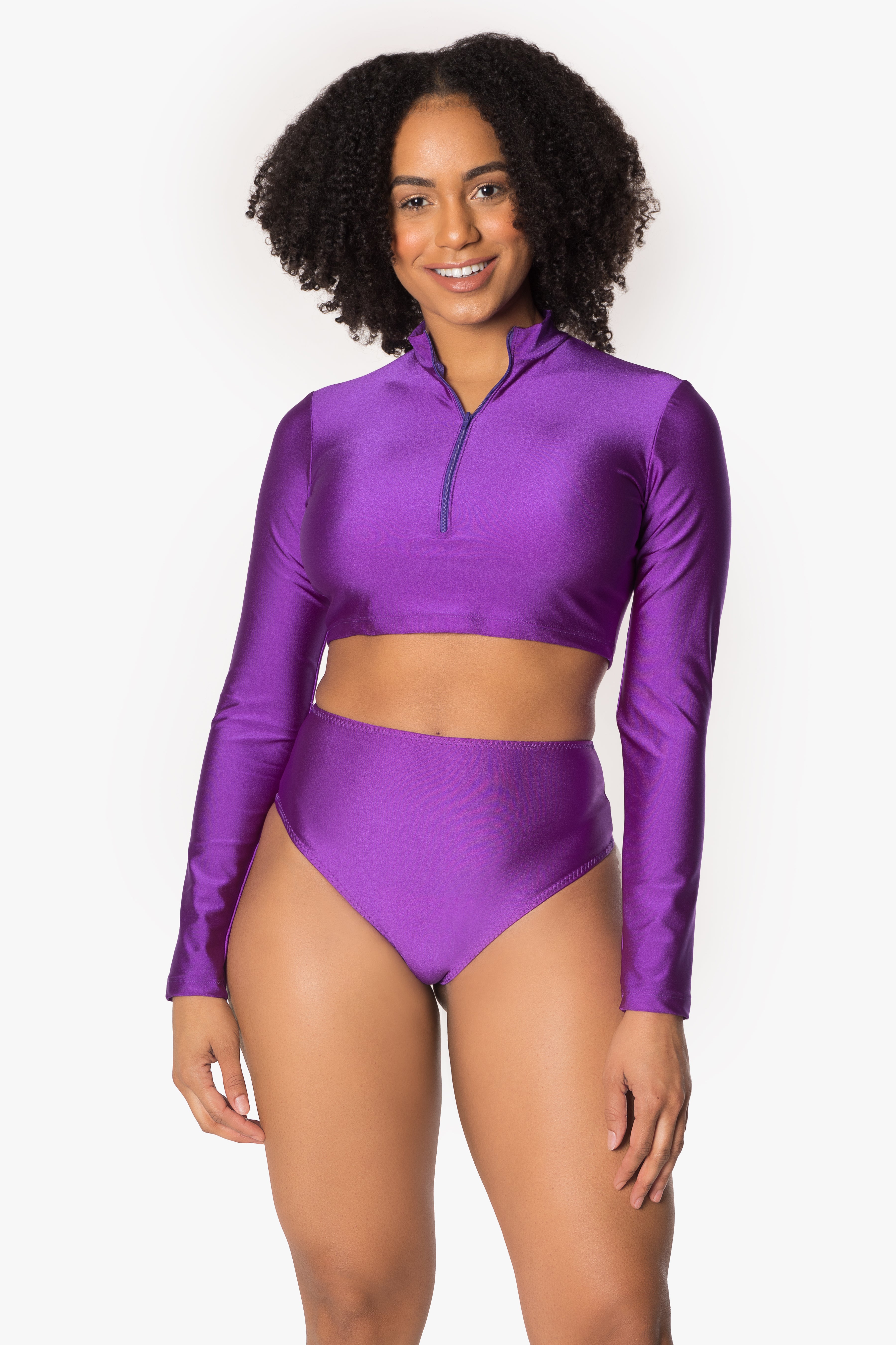 Top corto morado de manga larga con cremallera