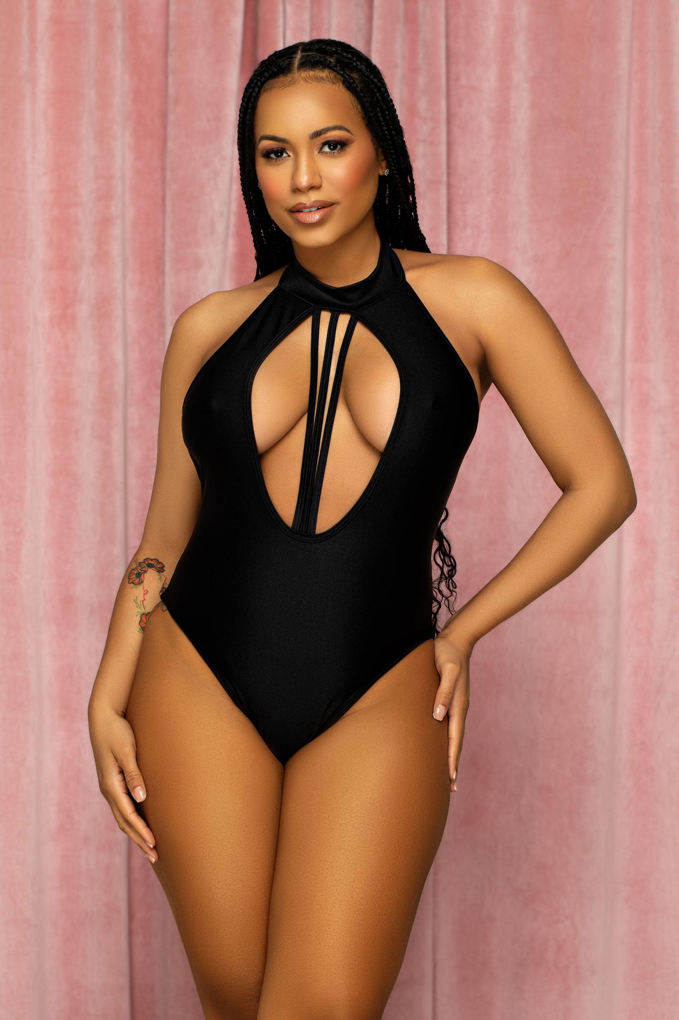 Body de tiras con corazón negro